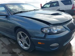 2006 Pontiac GTO with VIN 6G2VX12UX6L561098, listed as a IAAI auction lot 41487635 with 69,741 mi miles. Bid and sale history available at carsss.com. Image 18.