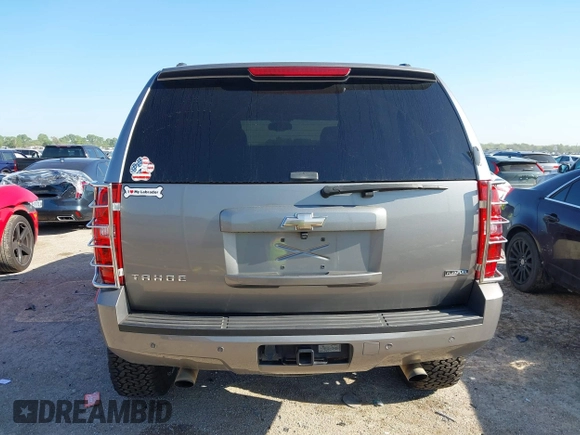 2009 Chevrolet Tahoe 2LT z VIN 1GNFC230X9R291177, wystawiony jako IAAI lot #41965944 z przebiegiem 71 073 mil mil oraz . Historia ofert i sprzedaży dostępna na DreamBid. Obrazek 16.