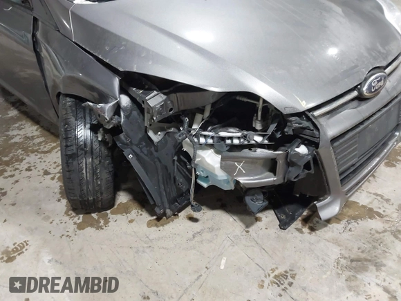 2013 Ford Focus SE with VIN 1FADP3F22DL270686, listed as a IAAI auction lot 40560064 with 84,681 mi miles and . Bid and sale history available at DreamBid. Image 6.