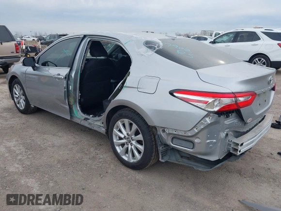2019 Toyota Camry LE z VIN 4T1B11HK3KU769178, wystawiony jako IAAI lot #41348861 z przebiegiem 121 069 mil mil oraz . Historia ofert i sprzedaży dostępna na DreamBid. Obrazek 3.