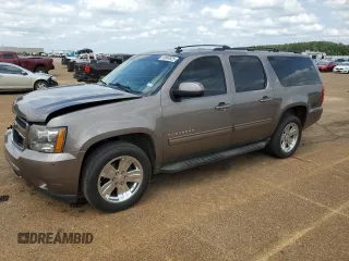 2013 Chevrolet Suburban LS with VIN 1GNSCHE00DR221307, listed as a Copart auction lot 54684925 with 203,169 mi miles and Salvage title. Bid and sale history available at DreamBid. Image 1.