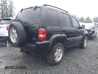 2002 Jeep Liberty Limited with VIN 1J8GL58KX2W198975, listed as a IAAI auction lot 41200746 with 220,079 mi miles and . Bid and sale history available at DreamBid. Image 4.