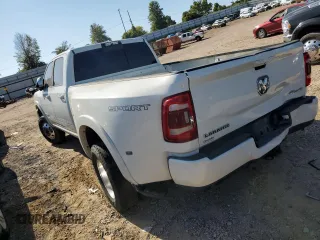 2019 Ram 3500 Laramie with VIN 3C63RRJL7KG676287, listed as a Copart auction lot 74248214 with 104,560 mi miles and Salvage Title. Bid and sale history available at carsss.com. Image 2.