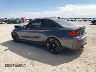 2017 BMW M2 z VIN WBS1H9C30HV887890, wystawiony jako Copart lot #41363883 z przebiegiem 69 688 mil mil oraz . Historia ofert i sprzedaży dostępna na DreamBid. Obrazek 2.