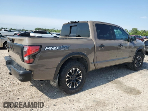 2021 Nissan Titan Pro-4X с VIN 1N6AA1ED2MN533749, выставлен на аукционе Copart как лот 54659655 с пробегом Не указан миль и Списание • Salvage title. История ставок и продаж доступна на DreamBid. Изображение 3.
