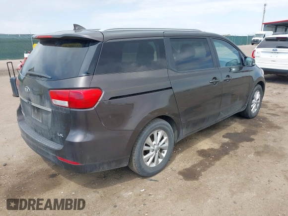 2015 Kia Sedona LX with VIN KNDMB5C13F6072586, listed as a IAAI auction lot 42090232 with 125,818 mi miles. Bid and sale history available at carsss.com. Image 4.