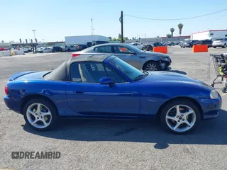 2003 Mazda MX-5 Miata Cloth z VIN JM1NB353830301964, wystawiony jako IAAI lot #42317534 z przebiegiem 192 342 mil mil oraz . Historia ofert i sprzedaży dostępna na DreamBid. Obrazek 13.