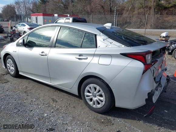 2021 Toyota Prius L Eco with VIN JTDKAMFU7M3143961, listed as a IAAI auction lot 41486032 with 58,979 mi miles. Bid and sale history available at carsss.com. Image 3.