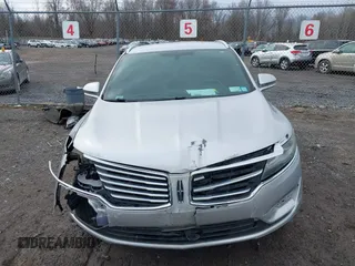 2015 Lincoln MKC with VIN 5LMTJ2AH6FUJ10863, listed as a IAAI auction lot 41983116 with 111,250 mi miles. Bid and sale history available at carsss.com. Image 18.