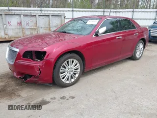 2012 Chrysler 300 C with VIN 2C3CCAKTXCH220185, listed as a IAAI auction lot 42110327 with 57,682 mi miles and . Bid and sale history available at DreamBid. Image 2.