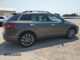 2015 Mazda CX-9 Grand Touring with VIN JM3TB2DA9F0468539, listed as a Copart auction lot 60829905 with 223,483 mi miles and Clean title. Bid and sale history available at DreamBid. Image 3.