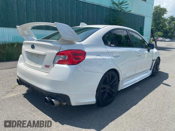2016 Subaru WRX STI with VIN JF1VA2V68G9803887, listed as a Copart auction lot 65673235 with 122,443 mi miles and Clean title. Bid and sale history available at DreamBid. Image 4.