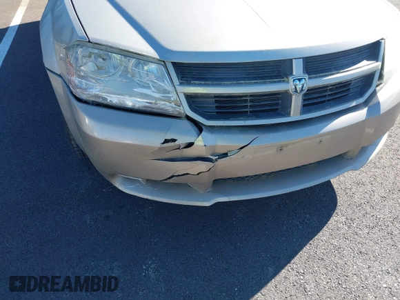 2009 Dodge Avenger SE with VIN 1B3LC46B99N559410, listed as a IAAI auction lot 42051094 with 133,272 mi miles and . Bid and sale history available at DreamBid. Image 6.