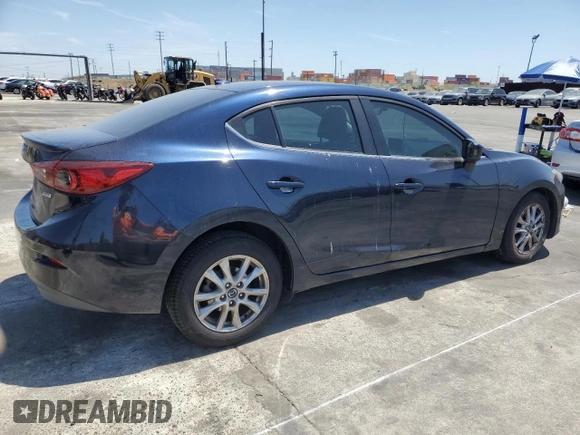 2015 Mazda 3 i Grand Touring with VIN 3MZBM1W7XFM135576, listed as a Copart auction lot 54060755 with 137,374 mi miles and Salvage title. Bid and sale history available at DreamBid. Image 3.