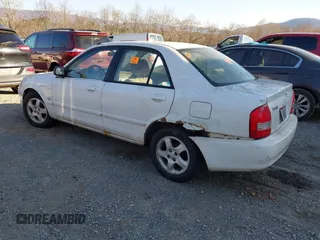 2001 Mazda Protege LX with VIN JM1BJ225710406286, listed as a IAAI auction lot 41887127 with Not Provided miles and . Bid and sale history available at DreamBid. Image 3.