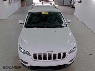 2021 Jeep Cherokee Altitude with VIN 1C4PJMLB4MD218294, listed as a IAAI auction lot 42097922 with 97,180 mi miles. Bid and sale history available at carsss.com. Image 1.