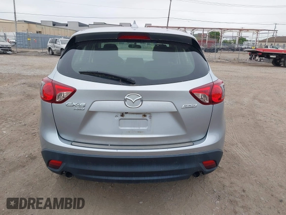 2016 Mazda CX-5 Sport z VIN JM3KE4BY1G0711602, wystawiony jako IAAI lot #42537627 z przebiegiem Nie podano mil oraz . Historia ofert i sprzedaży dostępna na DreamBid. Obrazek 16.