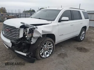 2018 GMC Yukon SLT with VIN 1GKS1BKC3JR279163, listed as a IAAI auction lot 40973940 with 122,445 mi miles. Bid and sale history available at carsss.com. Image 17.