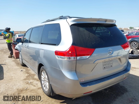 2011 Toyota Sienna XLE AAS with VIN 5TDYK3DC2BS048831, listed as a IAAI auction lot 42002556 with 231,906 mi miles and . Bid and sale history available at DreamBid. Image 3.