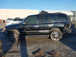 2002 GMC Yukon SLT with VIN 1GKEC13Z42J245768, listed as a IAAI auction lot 41769081 with 389,189 mi miles. Bid and sale history available at carsss.com. Image 14.