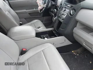 2015 Honda Pilot EX-L with VIN 5FNYF4H51FB064583, listed as a IAAI auction lot 41977746 with 120,398 mi miles and . Bid and sale history available at carsss.com. Image 5.