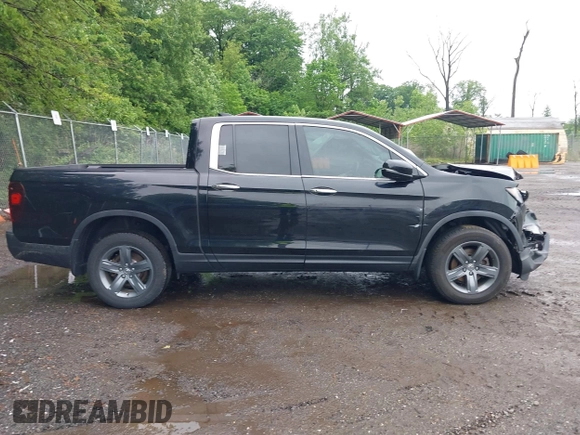 2021 Honda Ridgeline RTL-E with VIN 5FPYK3F75MB015370, listed as a IAAI auction lot 42253586 with 84,188 mi miles and . Bid and sale history available at DreamBid. Image 13.