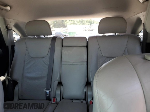 2011 Lexus RX 450h with VIN JTJZB1BA6B2004703, listed as a Copart auction lot 61730215 with 185,388 mi miles and Salvage title. Bid and sale history available at DreamBid. Image 10.