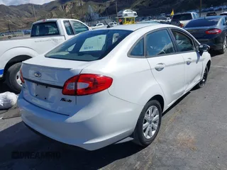 2012 Ford Fiesta SE with VIN 3FADP4BJ7CM102932, listed as a IAAI auction lot 41760394 with 70,394 mi miles and . Bid and sale history available at carsss.com. Image 4.