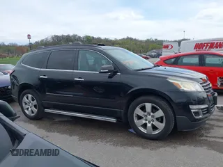 2014 Chevrolet Traverse LTZ with VIN 1GNKRJKD1EJ203282, listed as a IAAI auction lot 41984380 with 219,819 mi miles and . Bid and sale history available at DreamBid. Image 13.