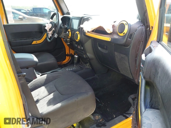 2013 Jeep Wrangler Unlimited Sport z VIN 1C4BJWDG6DL544197, wystawiony jako IAAI lot #41968556 z przebiegiem 121 101 mil mil oraz . Historia ofert i sprzedaży dostępna na DreamBid. Obrazek 5.