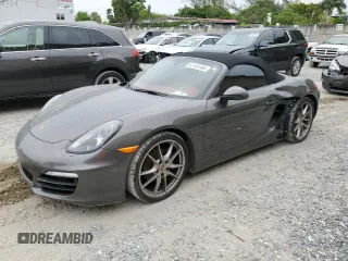 2014 Porsche Boxster with VIN WP0CA2A85EK120088, listed as a Copart auction lot 61135784 with 24,667 mi miles and Salvage Title. Bid and sale history available at carsss.com. Image 1.