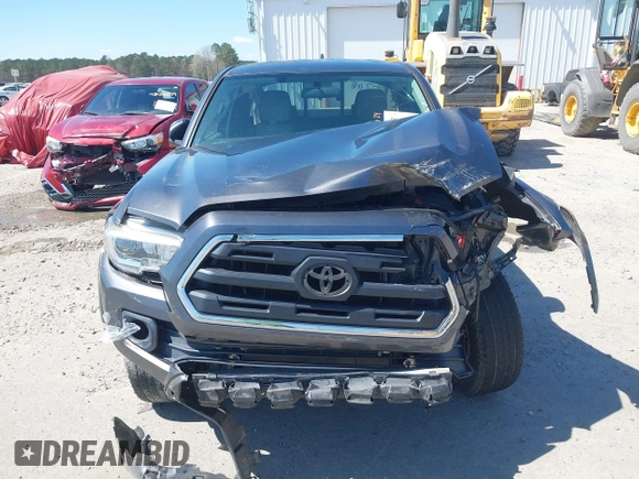 2016 Toyota Tacoma SR with VIN 5TFRX5GN6GX070766, listed as a IAAI auction lot 40461070 with 144,039 mi miles and . Bid and sale history available at DreamBid. Image 13.