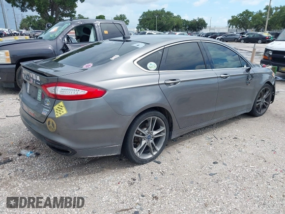 2013 Ford Fusion Titanium with VIN 3FA6P0K96DR131317, listed as a IAAI auction lot 42552736 with 154,762 mi miles and . Bid and sale history available at DreamBid. Image 4.