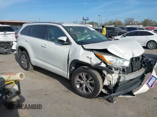 2014 Toyota Highlander XLE z VIN 5TDKKRFHXES016389, wystawiony jako IAAI lot #41817469 z przebiegiem 104 710 mil mil oraz . Historia ofert i sprzedaży dostępna na DreamBid. Obrazek 1.