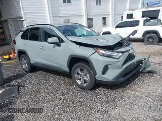 2022 Toyota RAV4 Hybrid XLE with VIN 4T3RWRFV5NU051932, listed as a IAAI auction lot 42503187 with 14,757 mi miles and . Bid and sale history available at DreamBid. Image 1.