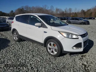 2013 Ford Escape SE with VIN 1FMCU0GX1DUA54924, listed as a Copart auction lot 88772845 with 193,180 mi miles and Salvage title. Bid and sale history available at DreamBid. Image 4.