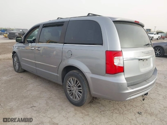 2014 Chrysler Town & Country Touring-L 30th Anniversary with VIN 2C4RC1CGXER454606, listed as a IAAI auction lot 41826042 with 173,300 mi miles. Bid and sale history available at carsss.com. Image 3.