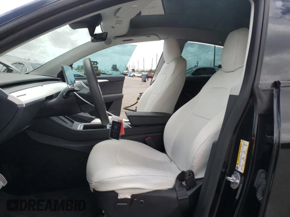 2023 Tesla Model Y Performance with VIN 7SAYGDEF8PF762915, listed as a Copart auction lot 50270285 with 23,893 mi miles and Salvage Title. Bid and sale history available at DreamBid. Image 7.