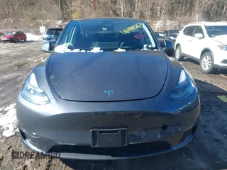 2023 Tesla Model Y Long Range with VIN 7SAYGAEE9PF905943, listed as a IAAI auction lot 41444255 with 11,179 mi miles and . Bid and sale history available at DreamBid. Image 11.