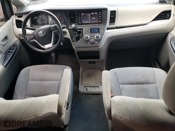 2019 Toyota Sienna L with VIN 5TDZZ3DC8KS006907, listed as a Copart auction lot 70310274 with 73,234 mi miles and Salvage Title. Bid and sale history available at carsss.com. Image 8.