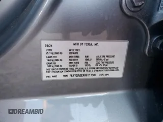 2024 Tesla Model Y Long Range z VIN 7SAYGAEEXRF211507, wystawiony jako Copart lot #56432715 z przebiegiem Nie podano mil oraz Szkoda całkowita • Salvage title. Historia ofert i sprzedaży dostępna na DreamBid. Obrazek 13.