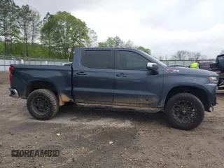2021 Chevrolet Silverado 1500 LT z VIN 1GCUYDET1MZ294871, wystawiony jako IAAI lot #41968489 z przebiegiem 90 733 mil mil oraz . Historia ofert i sprzedaży dostępna na DreamBid. Obrazek 13.