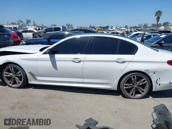 2020 BMW 5 Series M550i xDrive with VIN WBAJS7C0XLCD42738, listed as a IAAI auction lot 42326945 with 50,046 mi miles and . Bid and sale history available at DreamBid. Image 14.