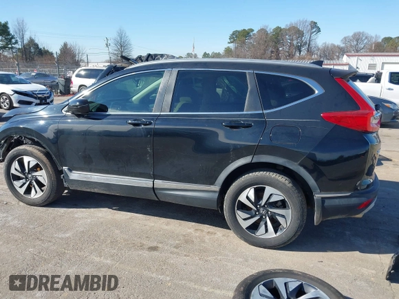 2017 Honda CR-V Touring with VIN 5J6RW1H97HL010429, listed as a IAAI auction lot 41151412 with 89,685 mi miles. Bid and sale history available at carsss.com. Image 15.