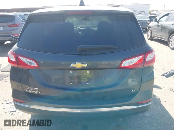 2021 Chevrolet Equinox LT with VIN 3GNAXKEV0ML378657, listed as a IAAI auction lot 41859327 with 51,550 mi miles and . Bid and sale history available at DreamBid. Image 16.