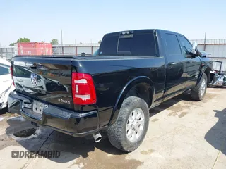 2022 Ram 2500 Laramie z VIN 3C6UR5FL6NG361636, wystawiony jako IAAI lot #42331483 z przebiegiem 58 812 mil mil oraz . Historia ofert i sprzedaży dostępna na DreamBid. Obrazek 4.