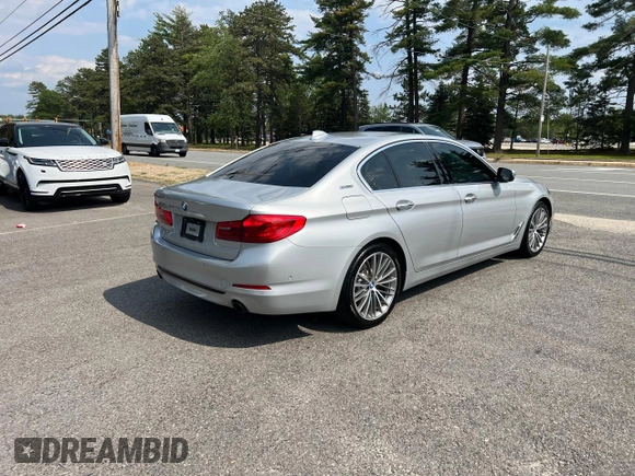 2018 BMW 5 Series 530e with VIN WBAJA9C59JG623166, listed as a Copart auction lot 60938995 with 82,070 mi miles and Clean title. Bid and sale history available at DreamBid. Image 4.