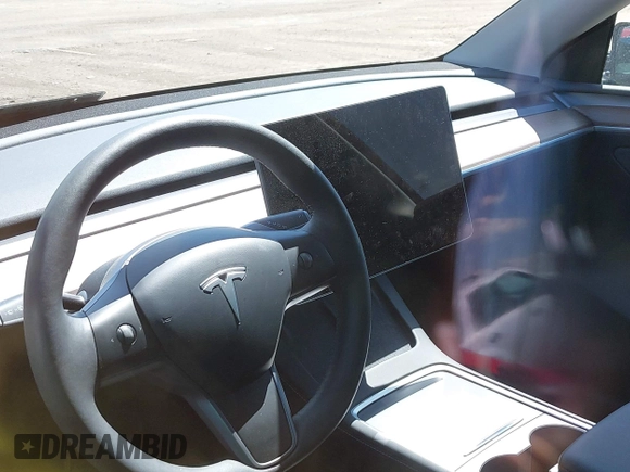 2024 Tesla Model Y Long Range with VIN 7SAYGAEE4RF078906, listed as a IAAI auction lot 42051207 with Not Provided miles and . Bid and sale history available at DreamBid. Image 7.