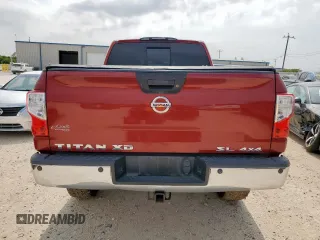 2016 Nissan Titan SL z VIN 1N6BA1F4XGN500750, wystawiony jako Copart lot #57608135 z przebiegiem 126 525 mil mil oraz Czysty tytuł • Clean title. Historia ofert i sprzedaży dostępna na DreamBid. Obrazek 6.