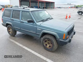 1997 Jeep Cherokee Sport with VIN 1J4FJ68S2VL569562, listed as a IAAI auction lot 42235601 with Not provided miles and . Bid and sale history available at DreamBid. Image 1.